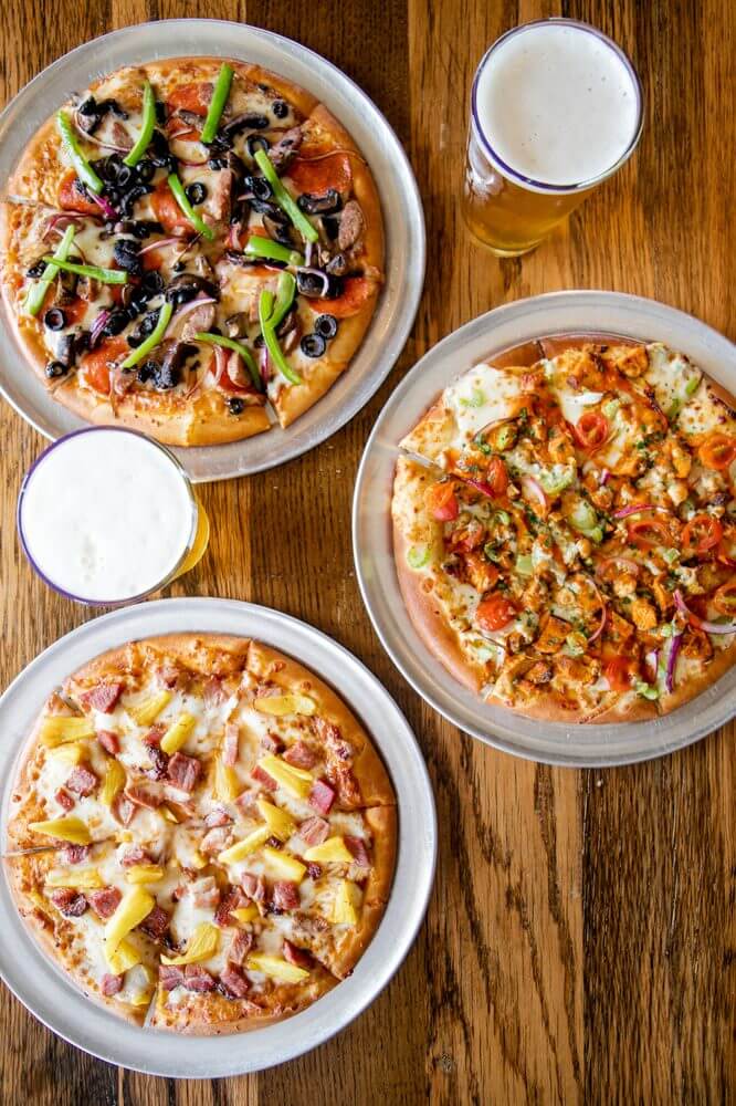 A tempting spread of pizzas and craft beer awaits visitors looking to refuel after an exciting game of bowling in San Marcos.