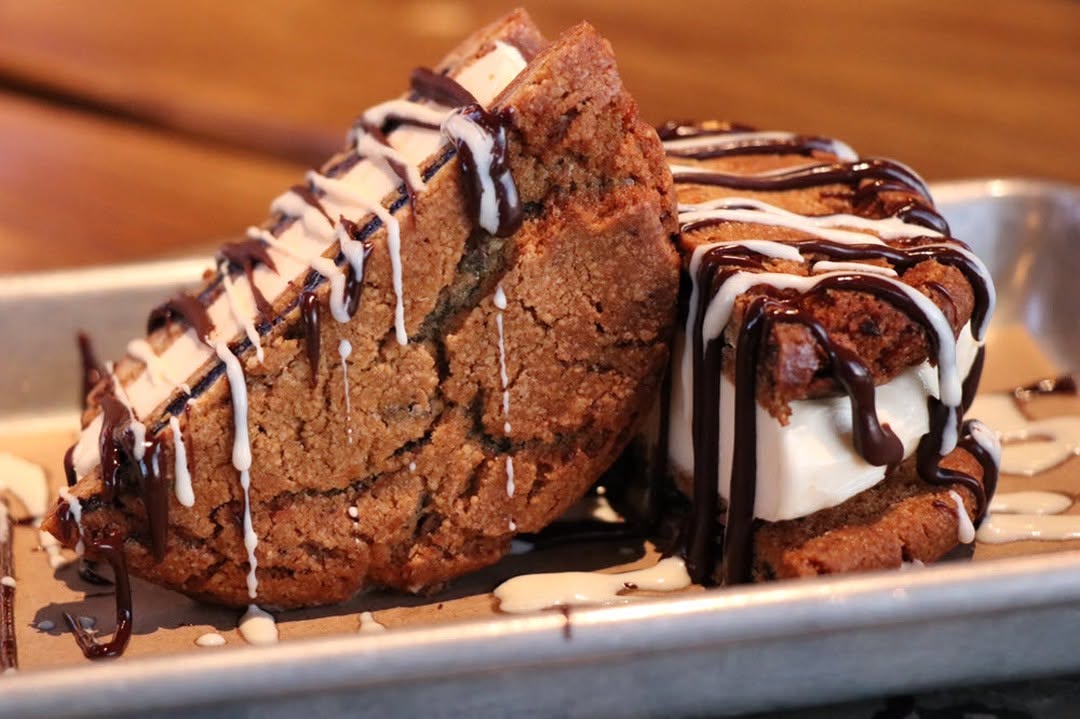 Girl Scouts sellincg their famous cookies outside Draft Republic, making sweet memories for kids in San Marcos.