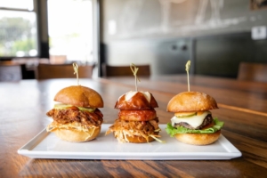 A fun and tasty slider trio with fried chicken, pulled pork, and a cheeseburger—great for kids in San Marcos. A fun and tasty slider trio with fried chicken, pulled pork, and a cheeseburger—great for kids in San Marcos.
